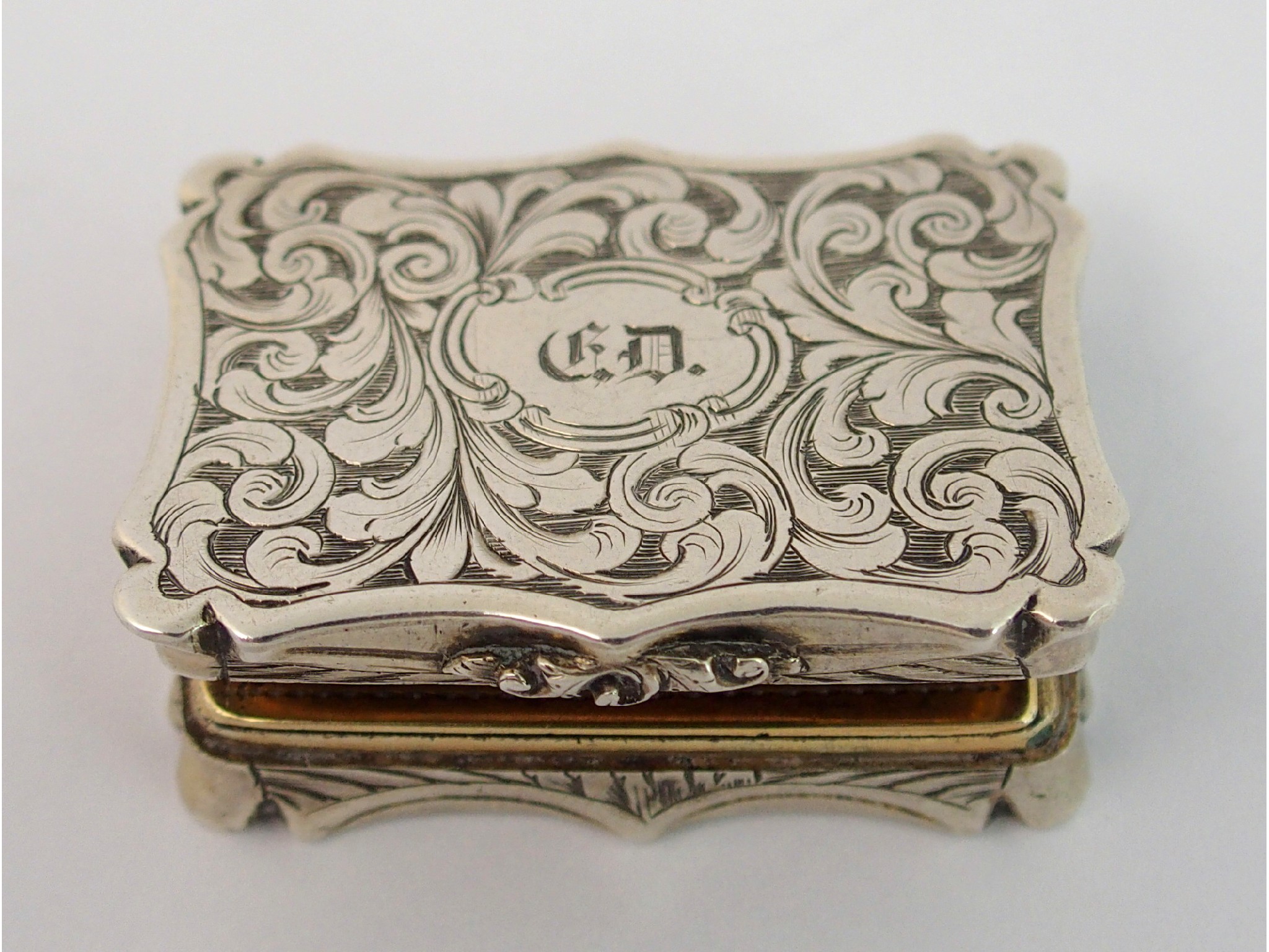 Appraisal: A silver vinaigretteby Nathaniel Mills Birmingham marks of rectangular shape