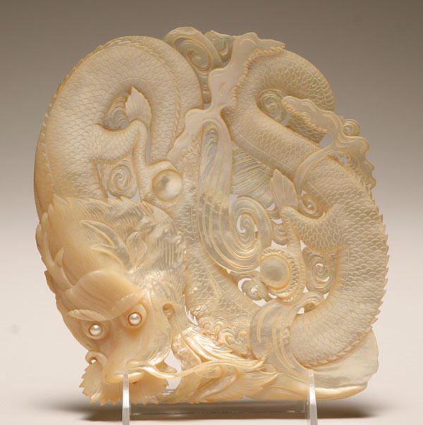 Appraisal: Chinese mother of pearl carving of a dragon with cultured