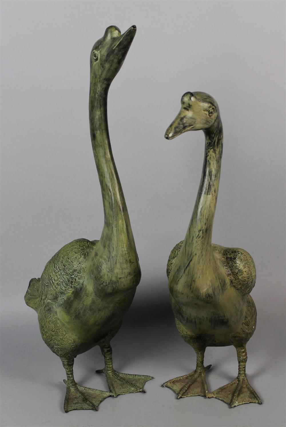 Appraisal: PAIR OF GREEN PAINTED METAL GARDEN GEESE FIGURES - h