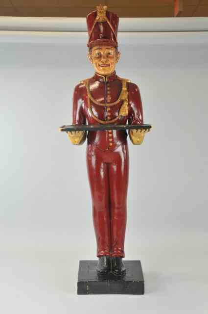 Appraisal: BELL HOP BUTLER STAND Full wooden figure of Bell Hop