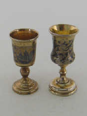 Appraisal: Two Russian silver-gilt and niello goblets one by Pyotr Loskutov