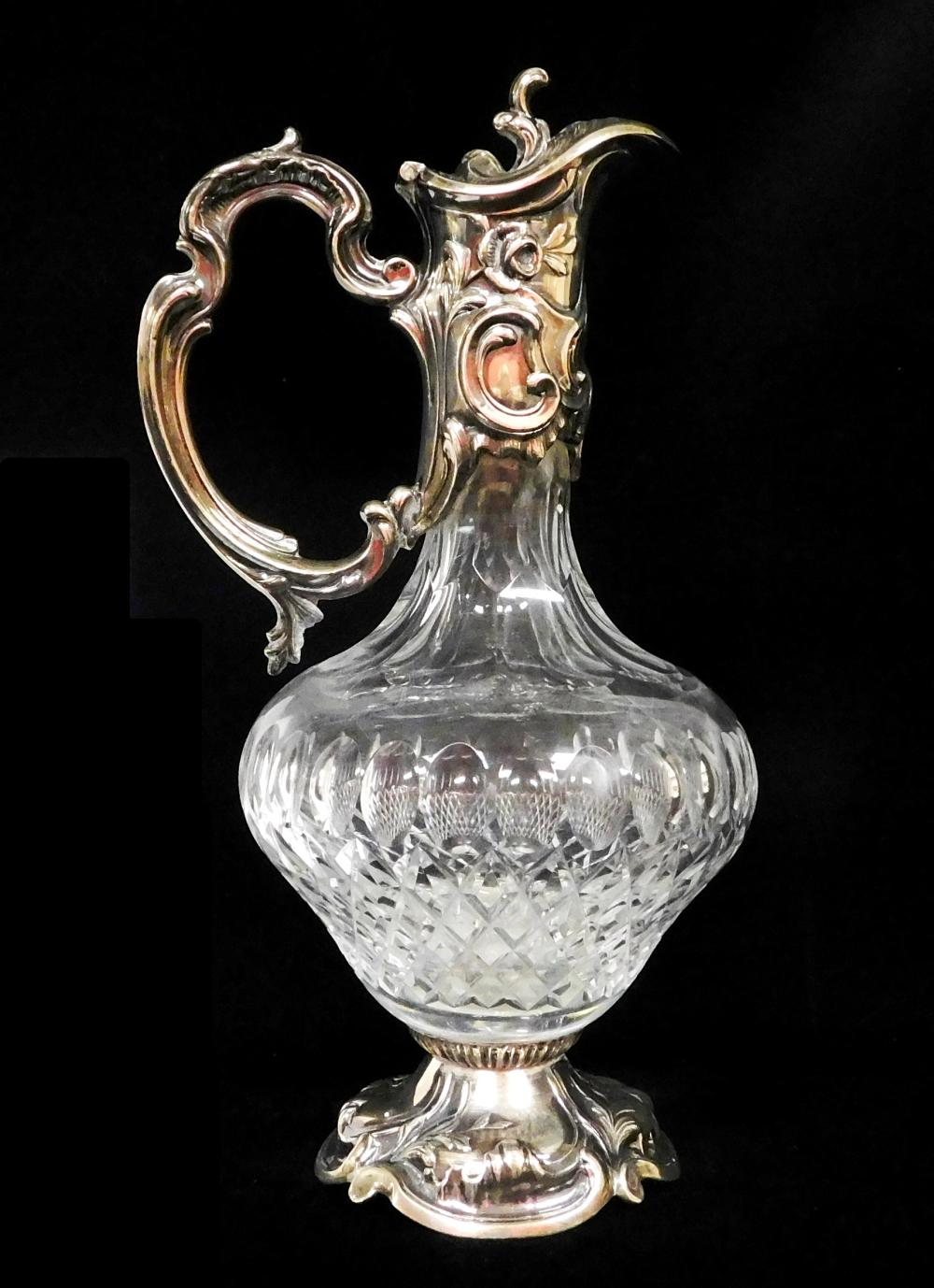 Appraisal: STERLING Ewer sterling mounted on cut glass repousse floral and