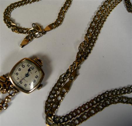 Appraisal: An early ladies gold Rolex wrist watch the square dial