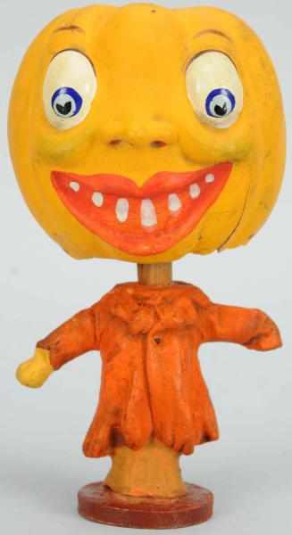 Appraisal: Halloween Pumpkin Head Nodder Two splits to left side of