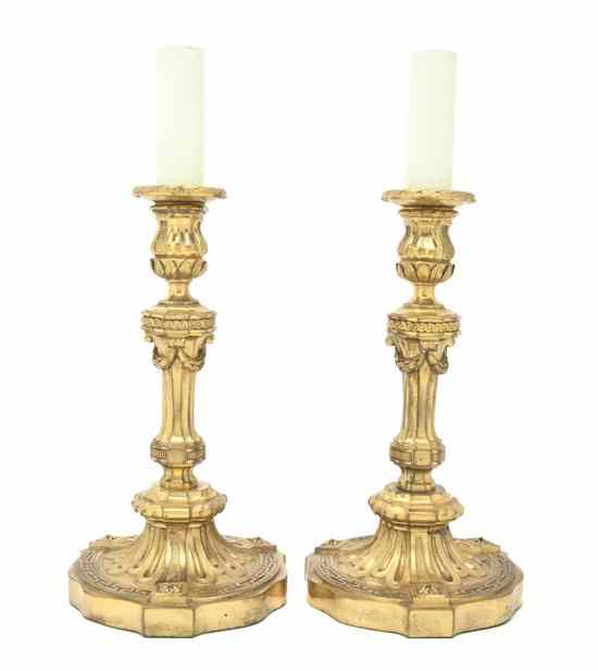 Appraisal: A Pair of Louis XVI Style Gilt Bronze Candlesticks each