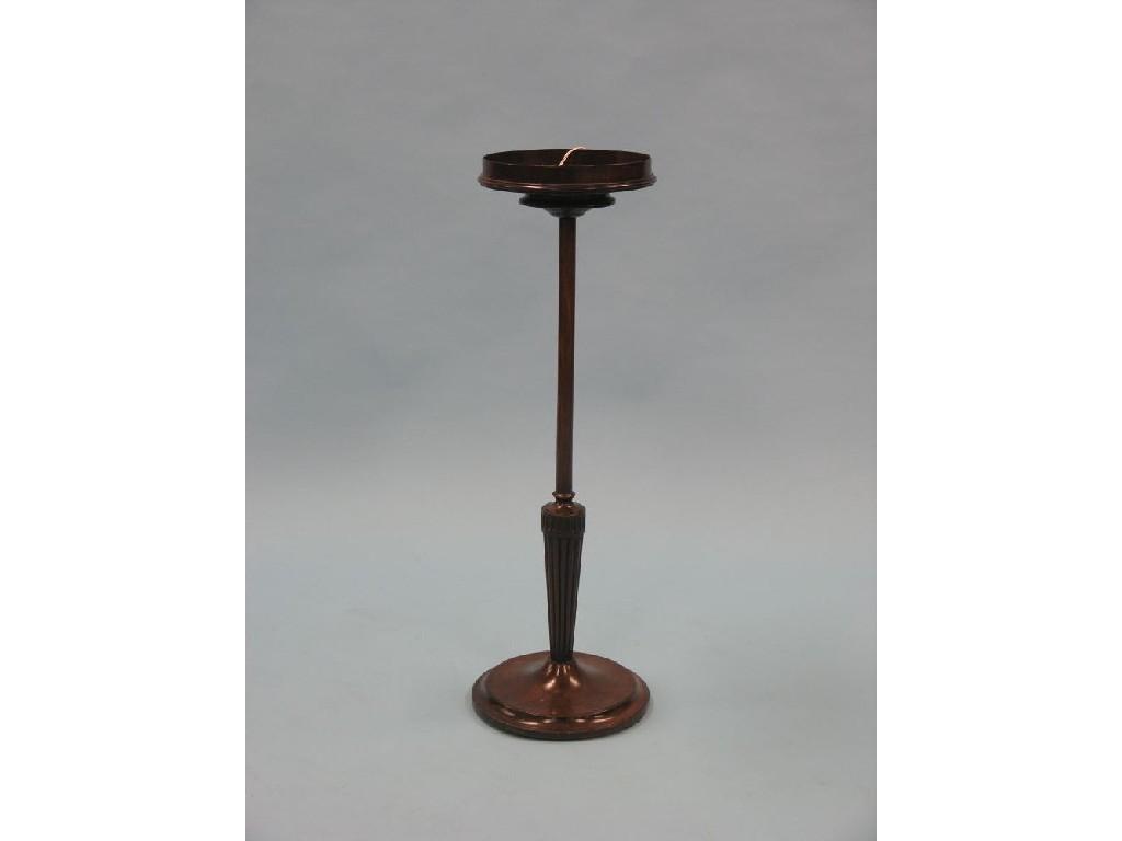 Appraisal: A mahogany candle stand circular tray-top inlaid with batswing medallion