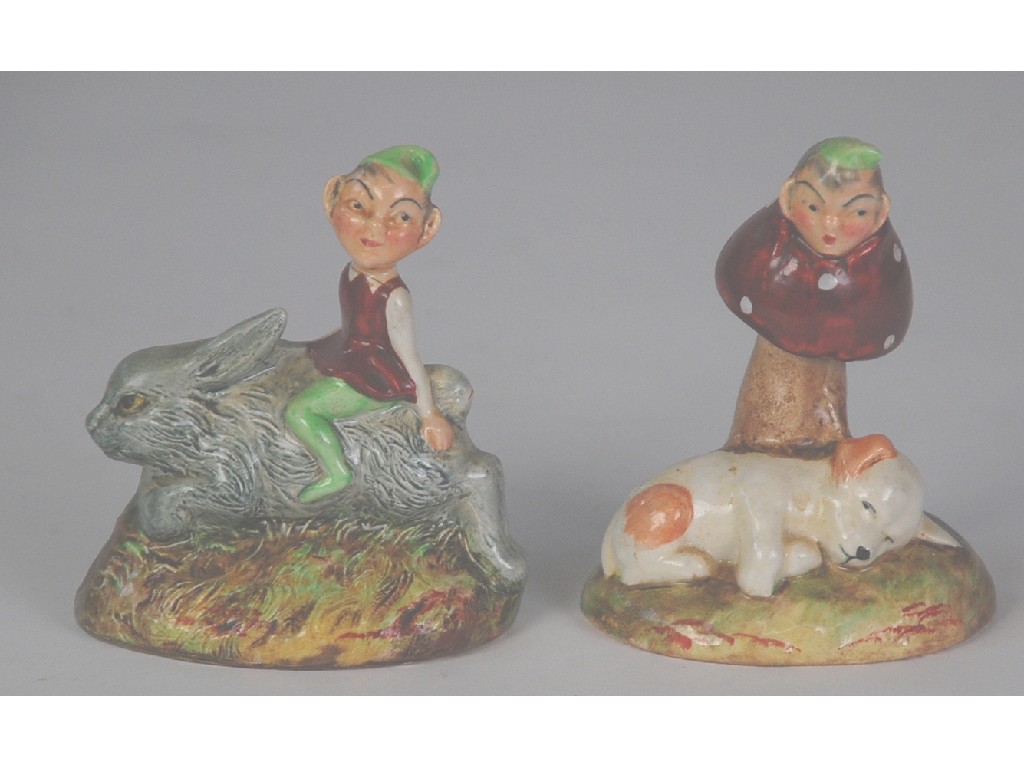 Appraisal: PAIR OF MORLEY 'PIXIE' POTTERY CONDIMENTS one modelled riding on