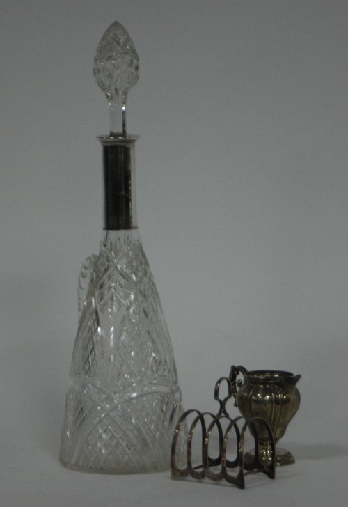 Appraisal: A silver mounted decanter London of tapering form with cut