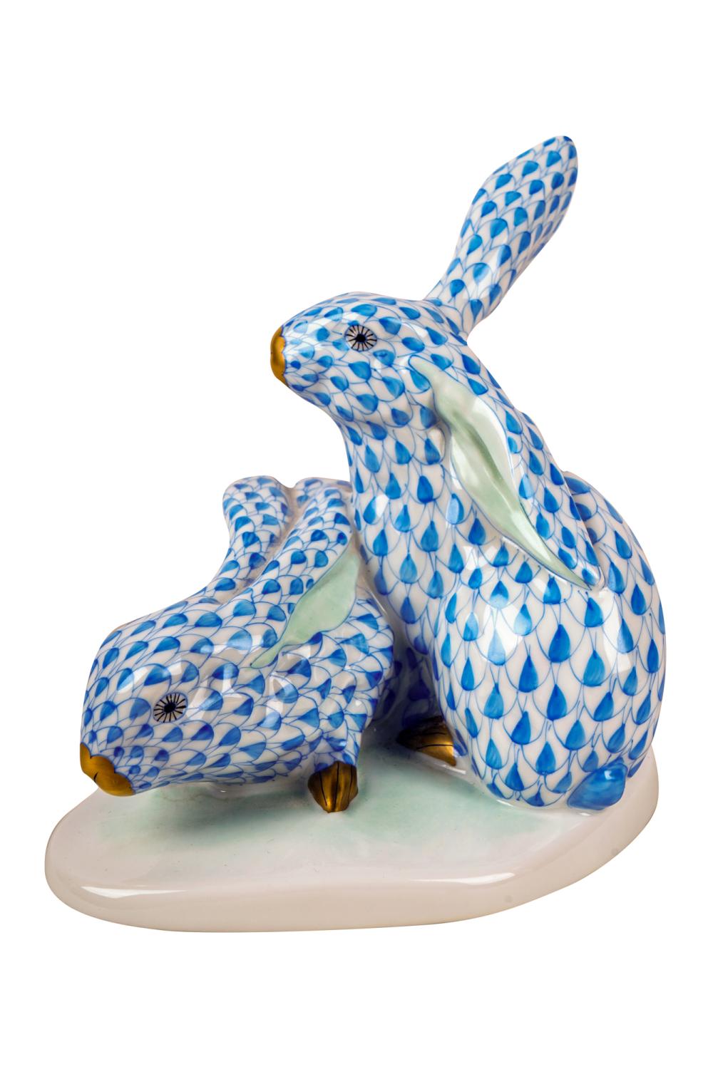 Appraisal: HEREND PORCELAIN BLUE FISHNET RABBIT GROUPblue Herend mark to underside