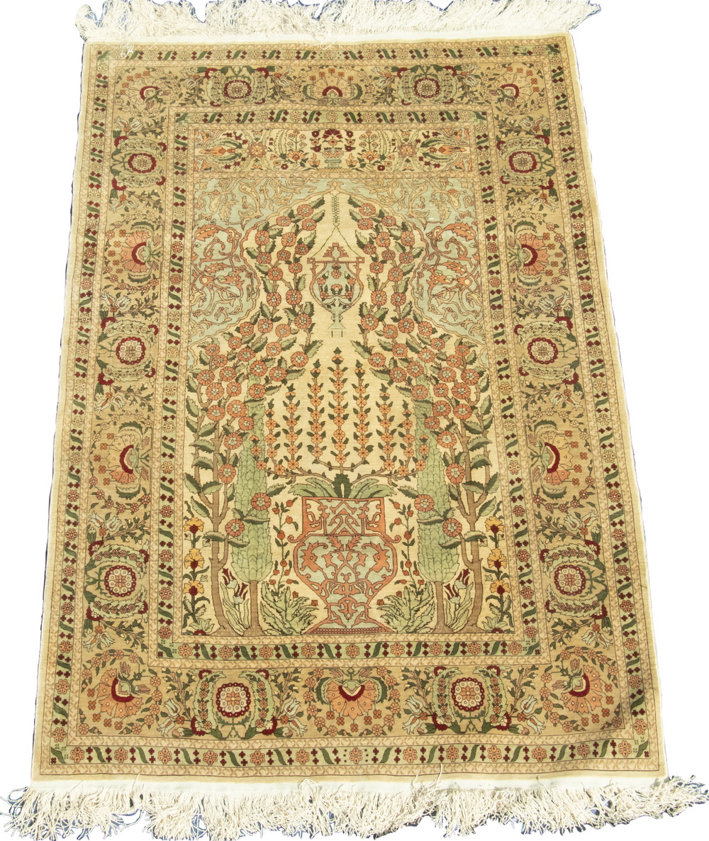 Appraisal: HEREKE SILK PRAYER RUG Cream ground mihrab covered with a