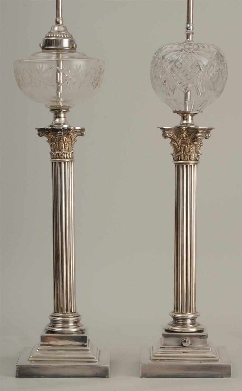 Appraisal: TWO SIMILAR SILVER-PLATED CORINTHIAN COLUMN-FORM LAMPS WITH CUT-GLASS OIL FONTS