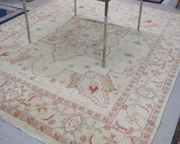 Appraisal: HAND KNOTTED ORIENTAL CARPET Oushak design of West Anatolia red