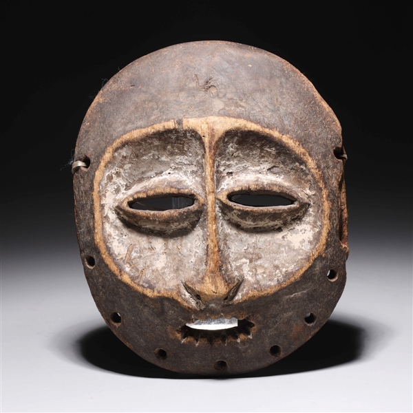 Appraisal: Carved wood circular mark from the Ivory Coast region of