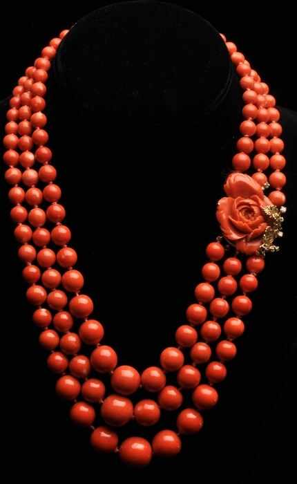 Appraisal: THREE STRAND CORAL NECKLACE WITH CARVED CORAL GOLD AND DIAMOND