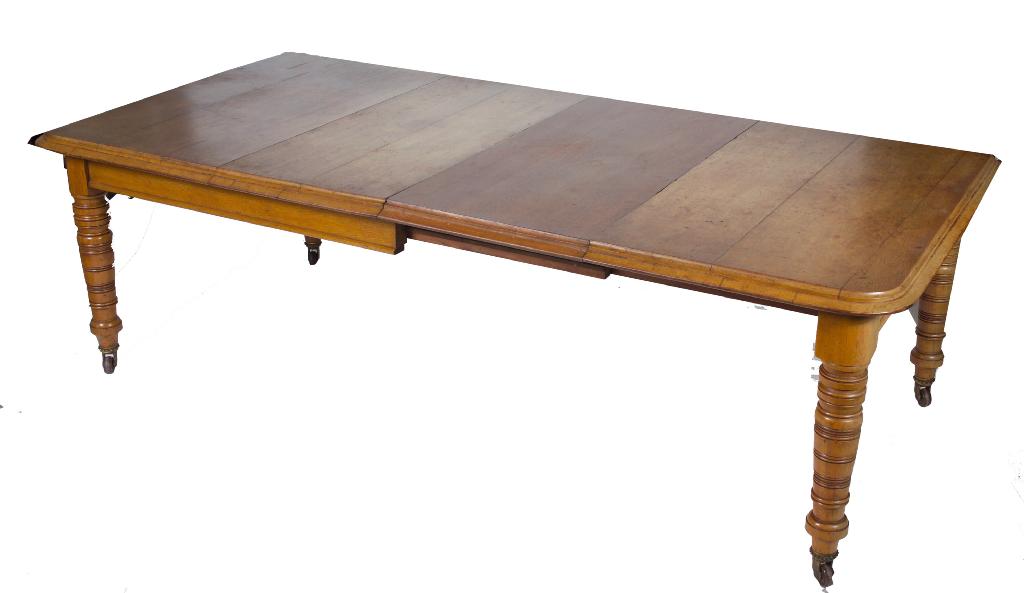 Appraisal: VICTORIAN GOLDEN OAK WIND-OUT DINING TABLE the moulded rectangular top