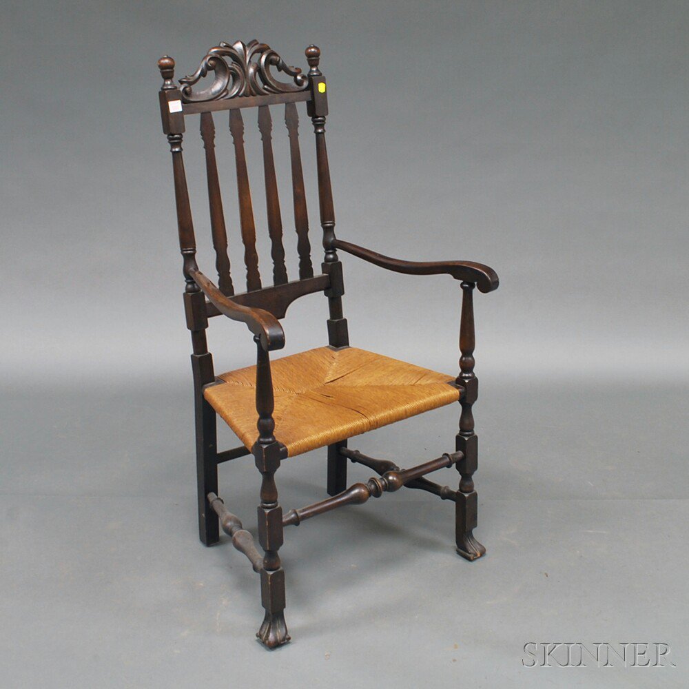 Appraisal: Stained and Carved Bannister-back Armchair th century the Prince of