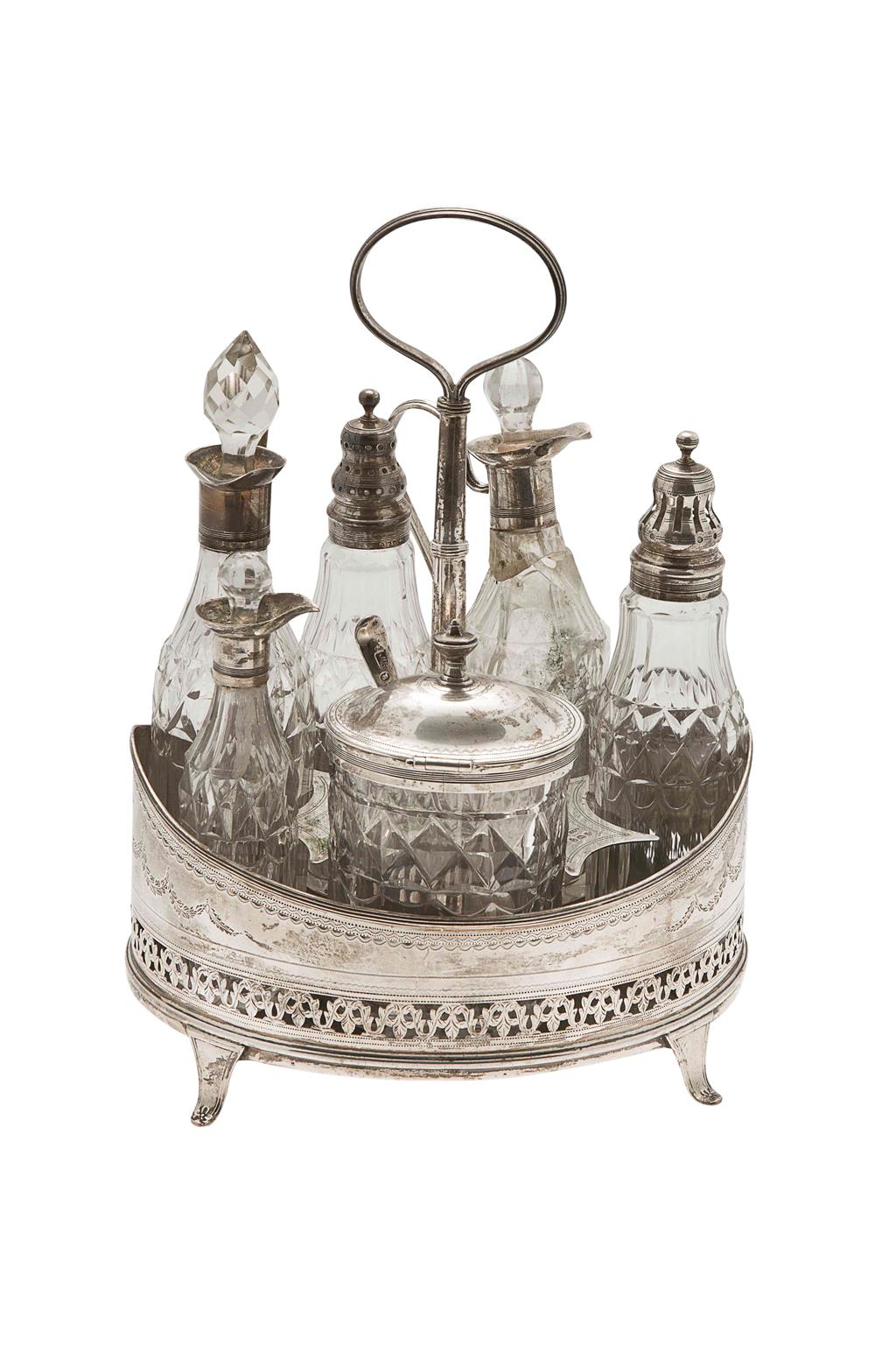 Appraisal: A late George III oval silver Warwick cruet William Abdy