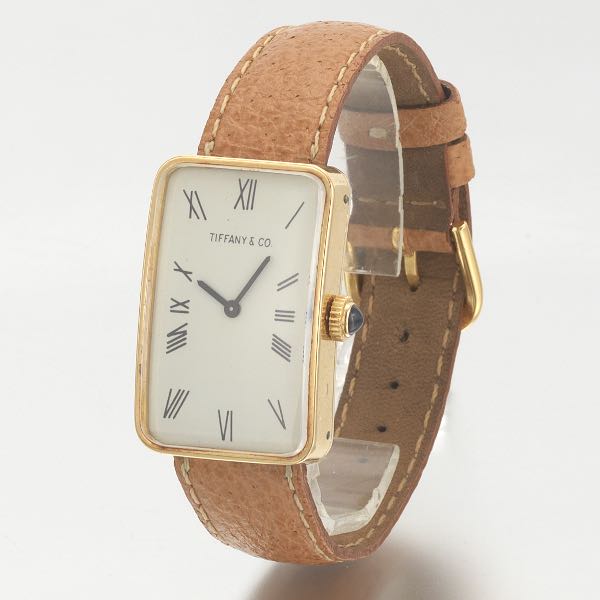 Appraisal: TIFFANY CO K GOLD TANK WATCH WITH LEATHER BAND K