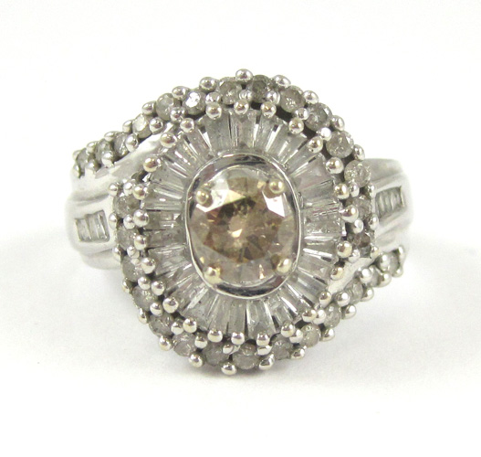 Appraisal: DIAMOND AND FOURTEEN KARAT WHITE GOLD RING with round-cut and