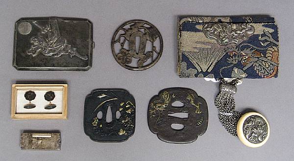 Appraisal: A group of metal objects Including three tsuba a pair