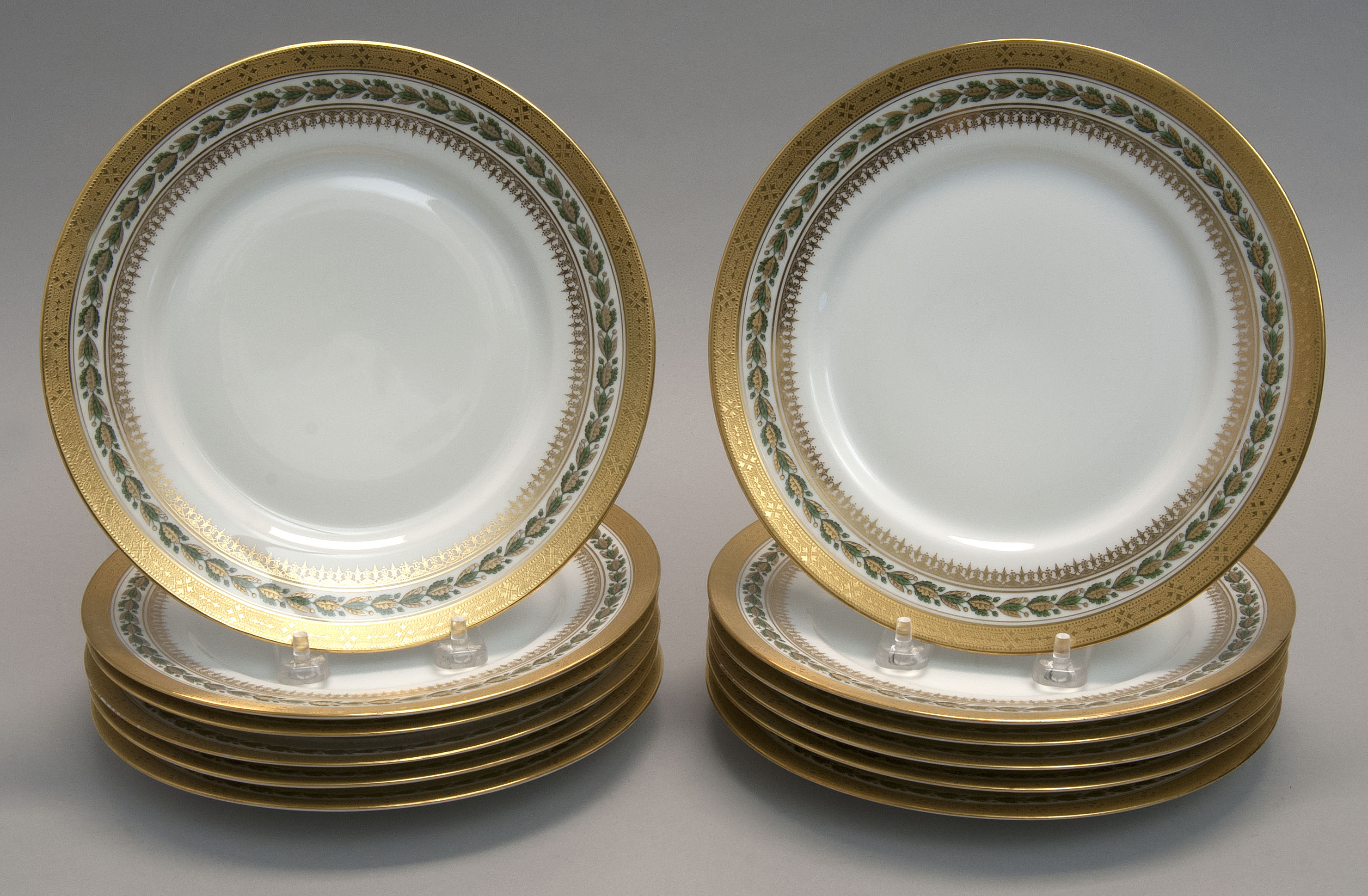 Appraisal: SET OF TWELVE LIMOGES PORCELAIN PLATES In a gold band