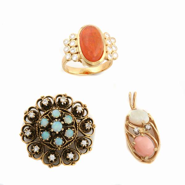 Appraisal: A collection of opal coral diamond and gold jewelry featuring