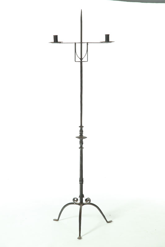 Appraisal: WROUGHT IRON FLOOR-STANDING CANDLEHOLDER Possibly European late th century Adjustable