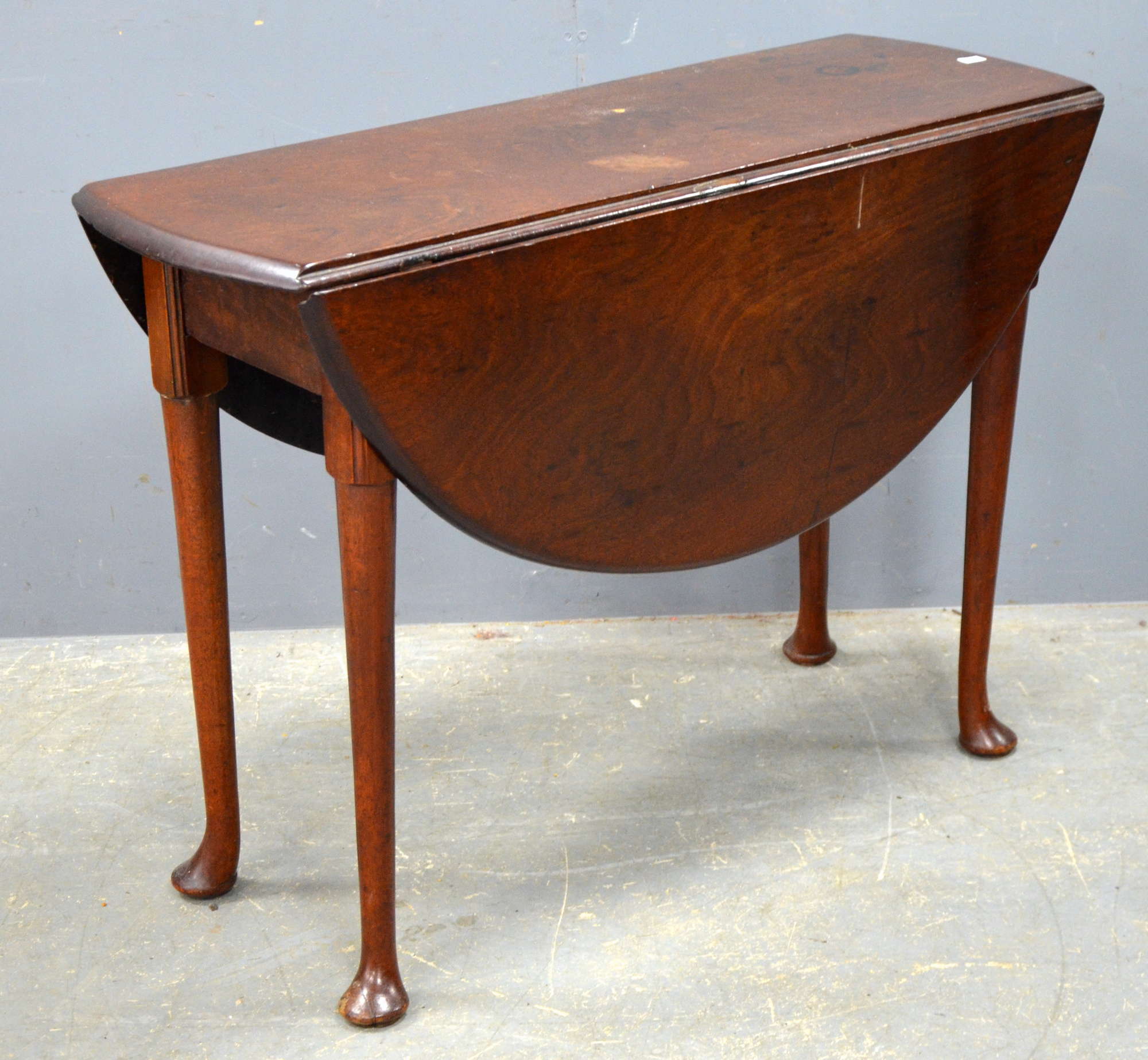 Appraisal: th century mahogany drop leaf dining table on pad feet