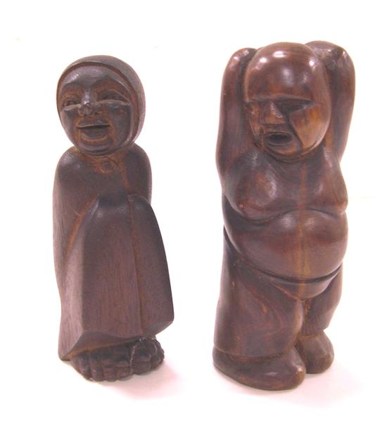 Appraisal: Ingrid Fetz American - two wooden carvings one figure in