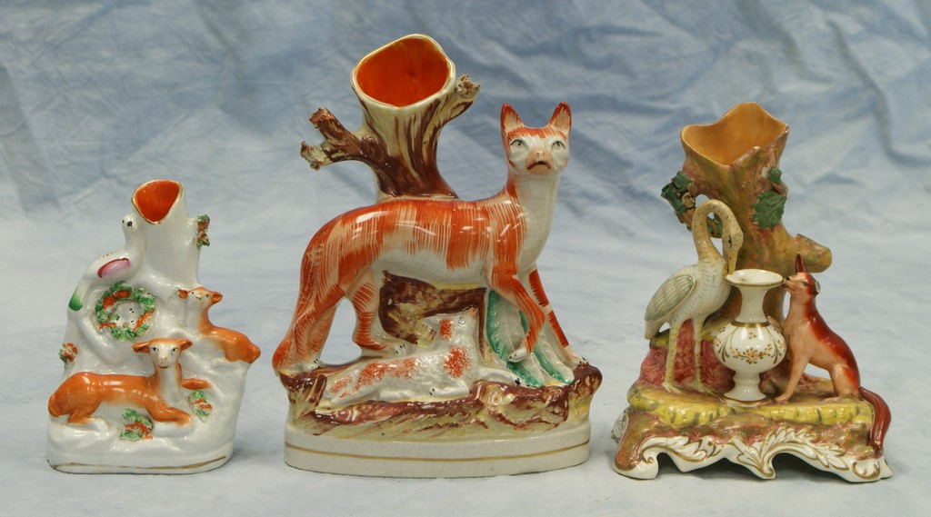 Appraisal: Staffordshire figural spill vases Fox and Rabbit small chips at