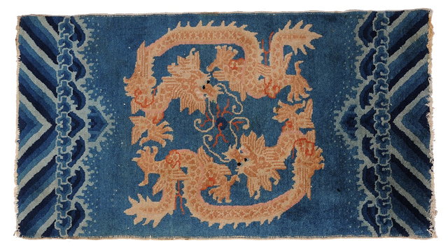 Appraisal: A CHINESE BLUE GROUND PILLAR RUG with two dragon designs