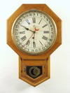 Appraisal: SCHOOL HOUSE CLOCK - Waterbury wall mounted oak case octagon