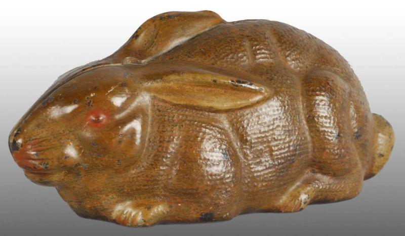 Appraisal: Cast Iron Rabbit Lying Down Still Bank Description Made in