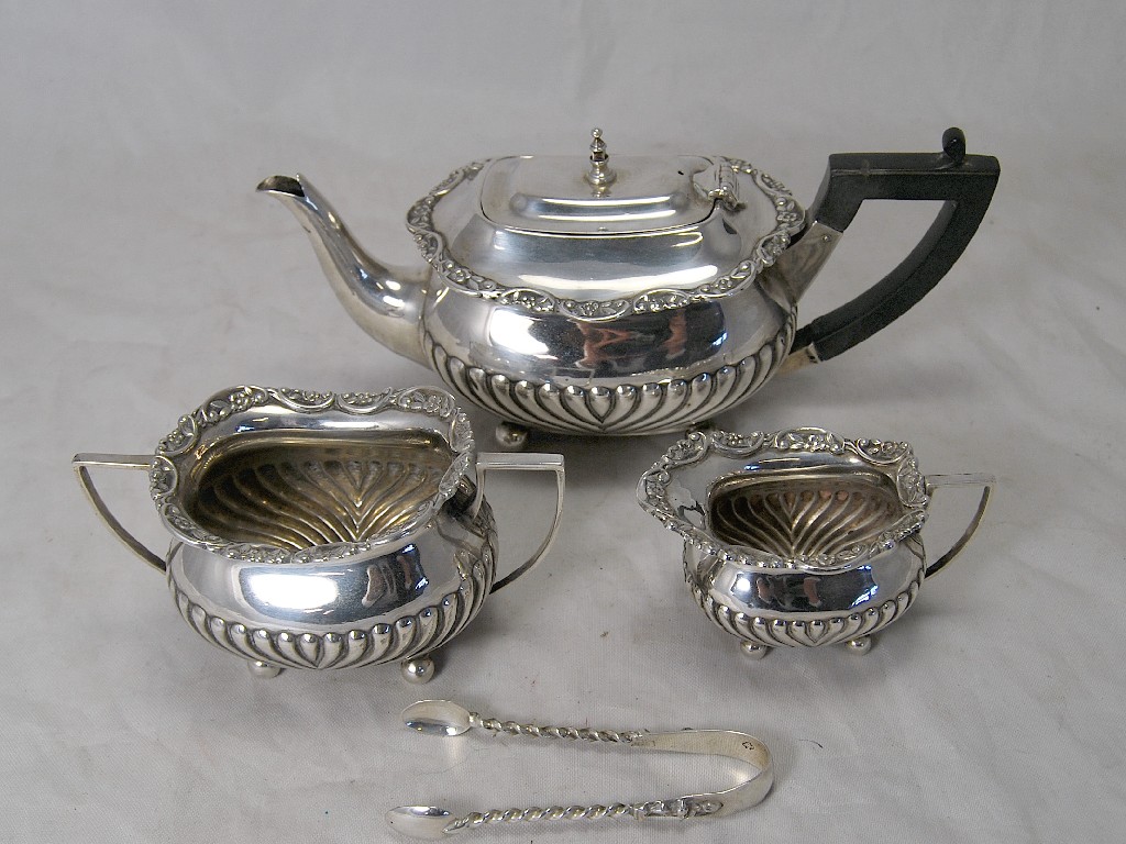 Appraisal: Victorian silver half fluted rectangular breakfast tea service with cast