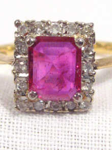 Appraisal: An carat gold ruby and diamond ring the rectangular ruby