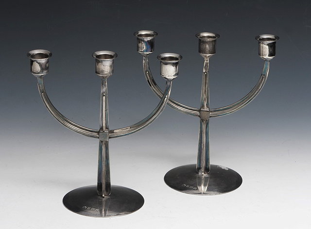 Appraisal: Elkington and Co Pair of modernist silver three branch candelabraBirmingham