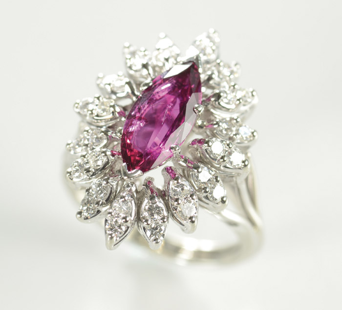 Appraisal: RHODOLITE GARNET AND DIAMOND RING k white gold with round-cut