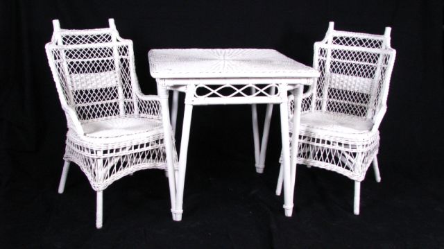 Appraisal: Square Wicker Table and Two Arm Chairs