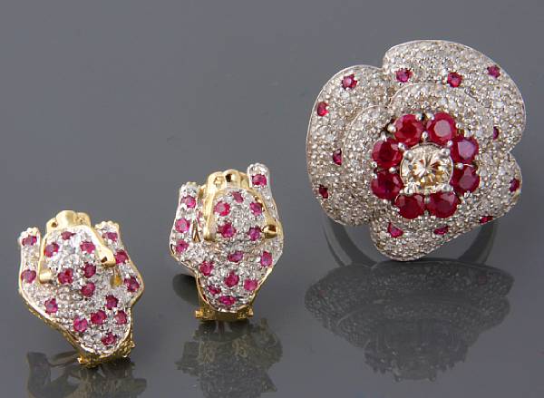 Appraisal: A diamond ruby and k white gold floral ring together