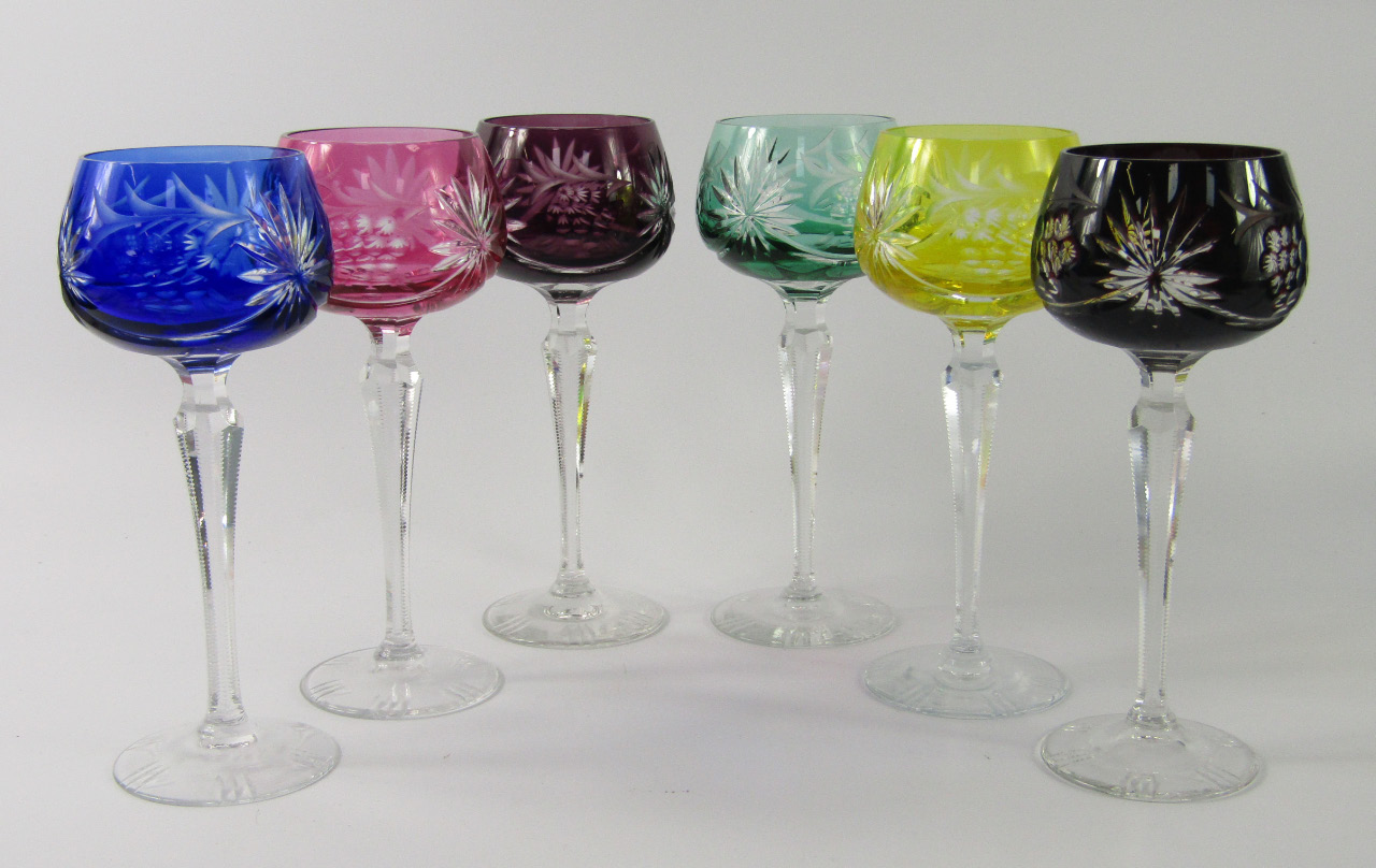 Appraisal: A set of six Bohemian vari-coloured hock glasses with engraved