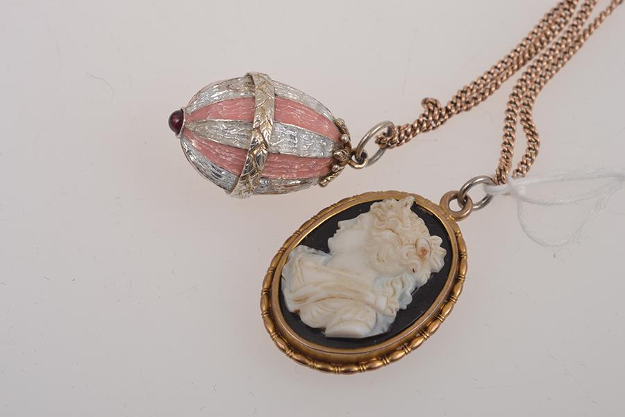 Appraisal: A CAMEO PENDANT TOGETHER WITH ENAMEL EGG A CAMEO PENDANT