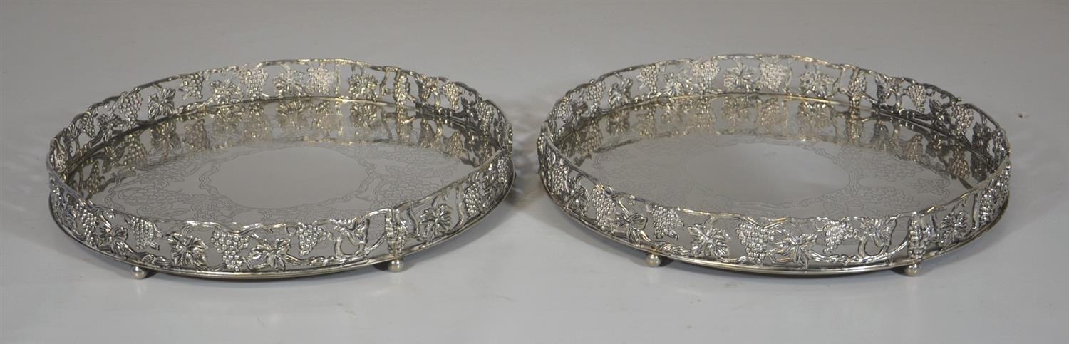 Appraisal: Pair of silver plate gallery trays with grape and leaf