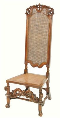 Appraisal: A late th century style walnut high back chair with