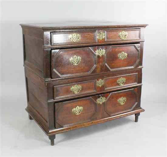 Appraisal: A late th century Jacobean oak two section chest with