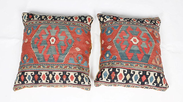 Appraisal: A PAIR SHAHSAVAN CRADLE ENDS now adapted as cushion covers