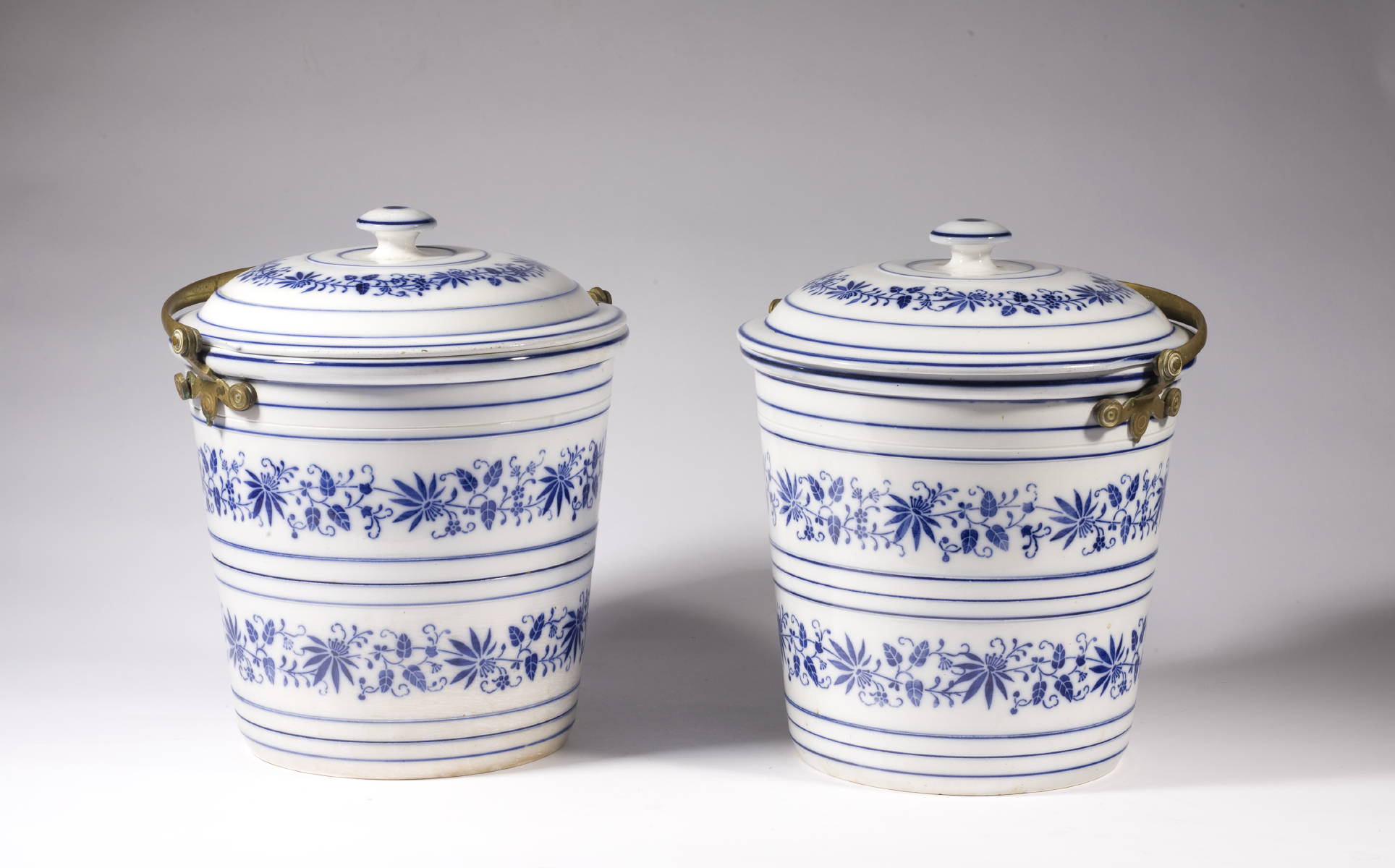 Appraisal: PAIR OF CONTINENTAL BLUE AND WHITE POTTERY COVERED PAILS WITH