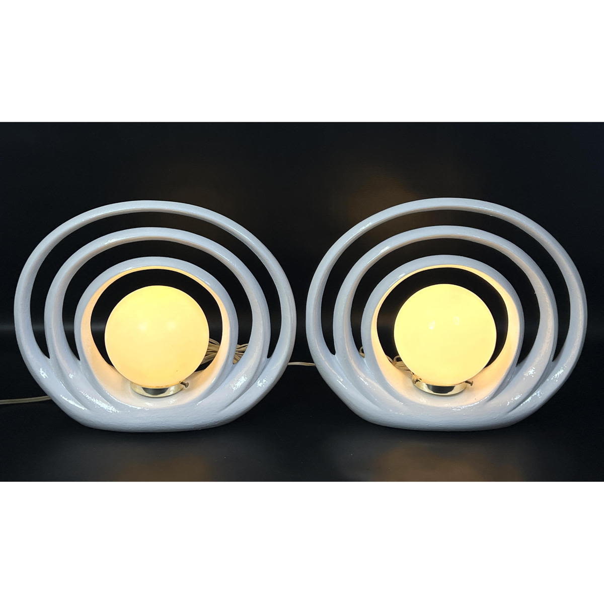 Appraisal: Pr White Glazed Concentric Circle Modernist Lamps Round Ball Shades