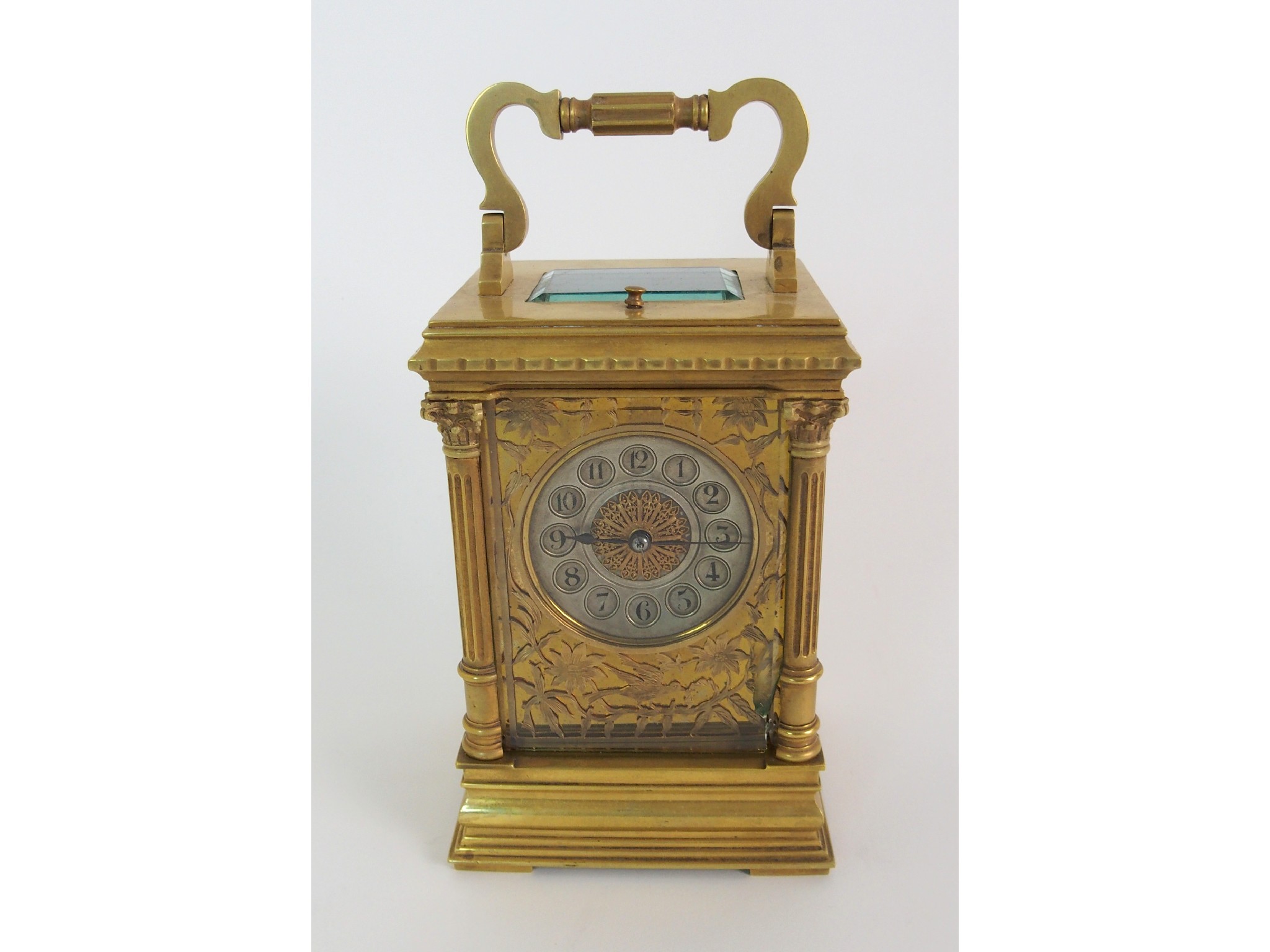 Appraisal: A gilt brass and glass repeater carriage clocksilvered metal dial