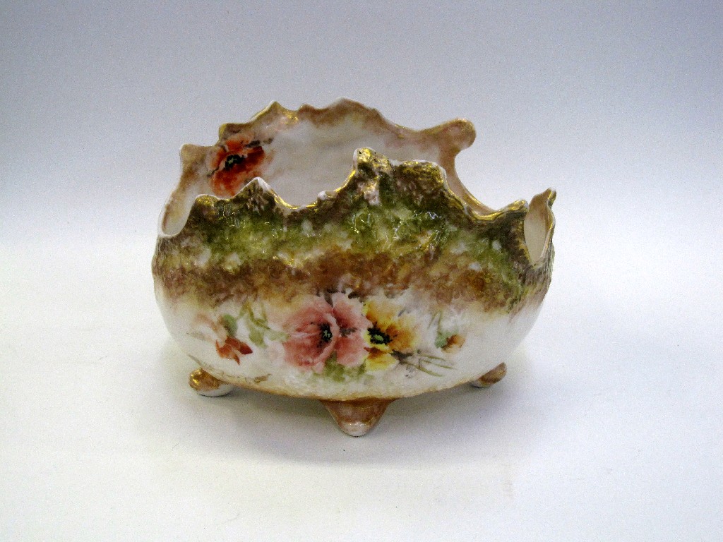 Appraisal: Nautilus porcelain shell shaped dish on four feet with hand