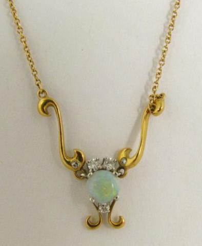 Appraisal: K Yellow Gold opal pendant with three round accent diamonds